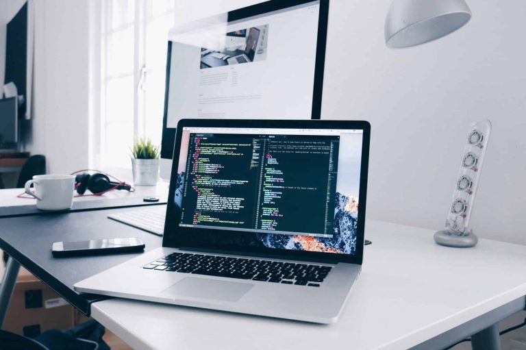 Office environment where business professionals interact with digital interfaces or AI-powered tools.